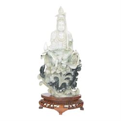 Chinese carved hardstone figure of Guanyin on wooden base, H31cm