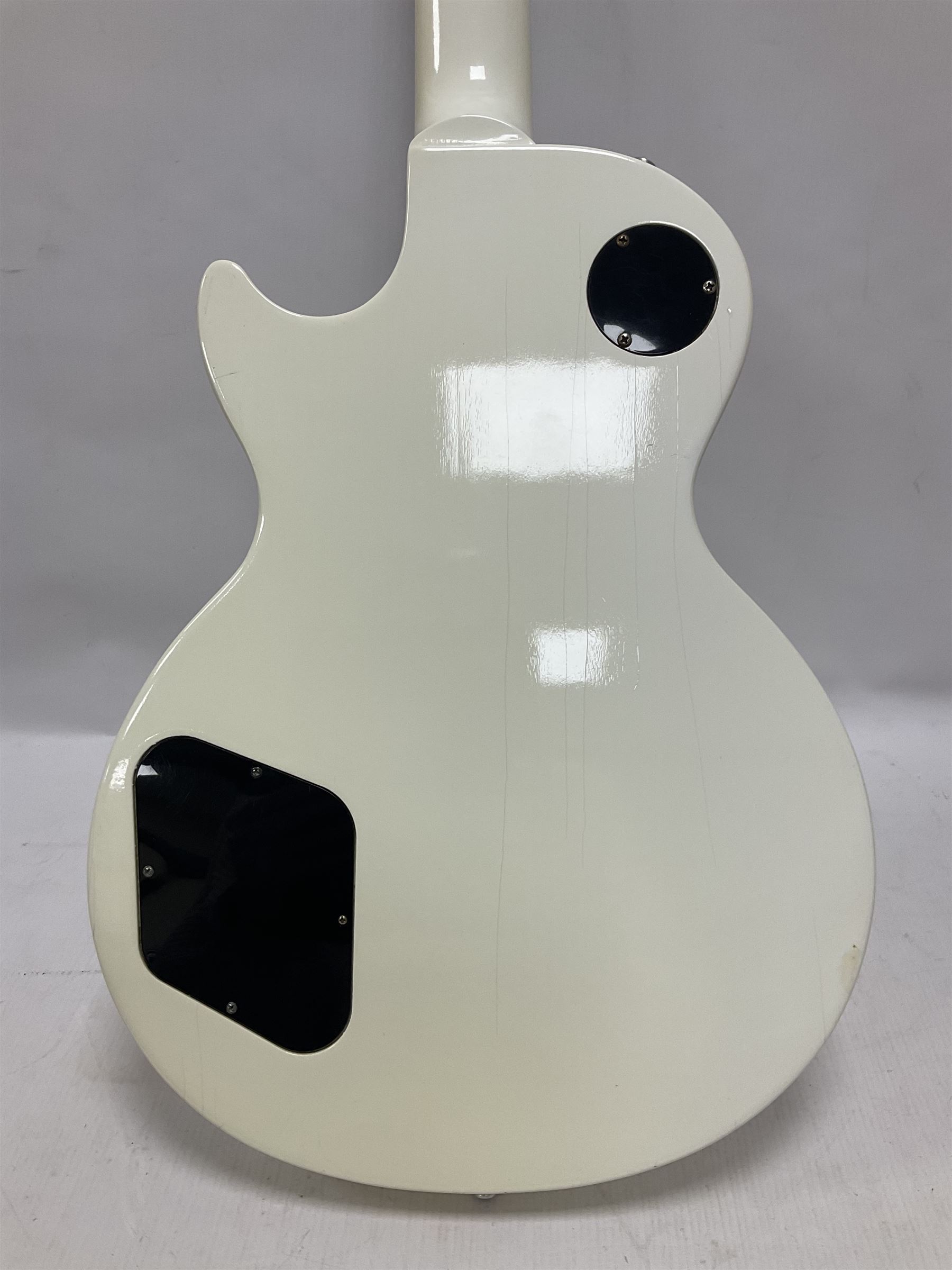 2010 Gibson Les Paul studio guitar, serial no101500537 in white finish with gold and pale green hardware, in Auden soft carry case, guitar L100cm
