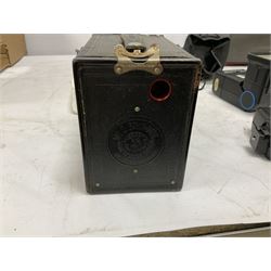 Quantity of cameras and accessories to include Olympus Trip 35, Minolta A f-EII 35mm, Yashica Auto Focus camera, Hanimex 35mm af camera in case, Kodak No.2A Folding Pocket Brownie camera in case, Minolta VLT-501 lens, etc