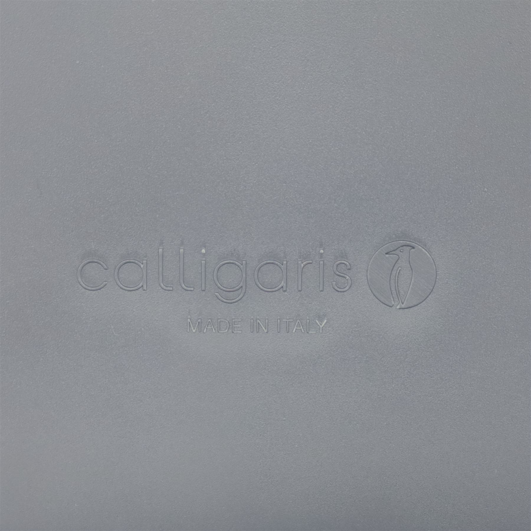 Calligaris - Connubia dining suite, comprising a 'Zeffiro' glass extending dining table and eight 'Academy' chairs, rectangular clear glass top with twin extension leaves extending to 220cm, mounted on white and ochre metal supports with central stretcher, together with eight matching moulded dining chairs with shaped seats and tapered legs