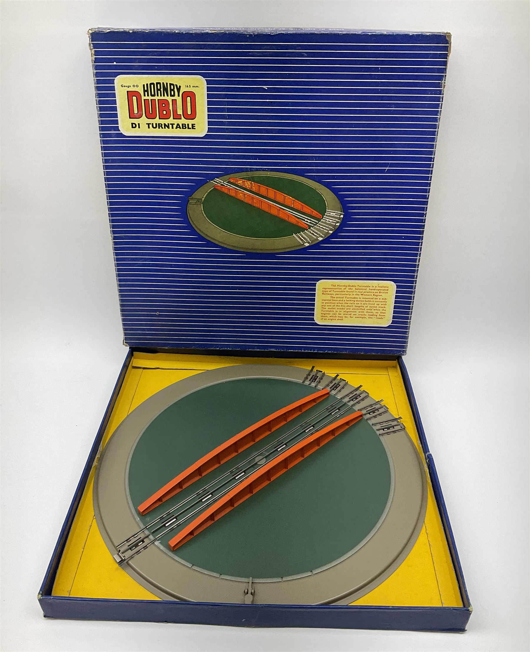 Hornby Dublo - six D1 accessories comprising Turntable; Through Station with separately boxed Platform Extension with Wall; Signal Cabin with orange roof and two packs of station names; Level Crossing; and Island Platform; all boxed (6)
