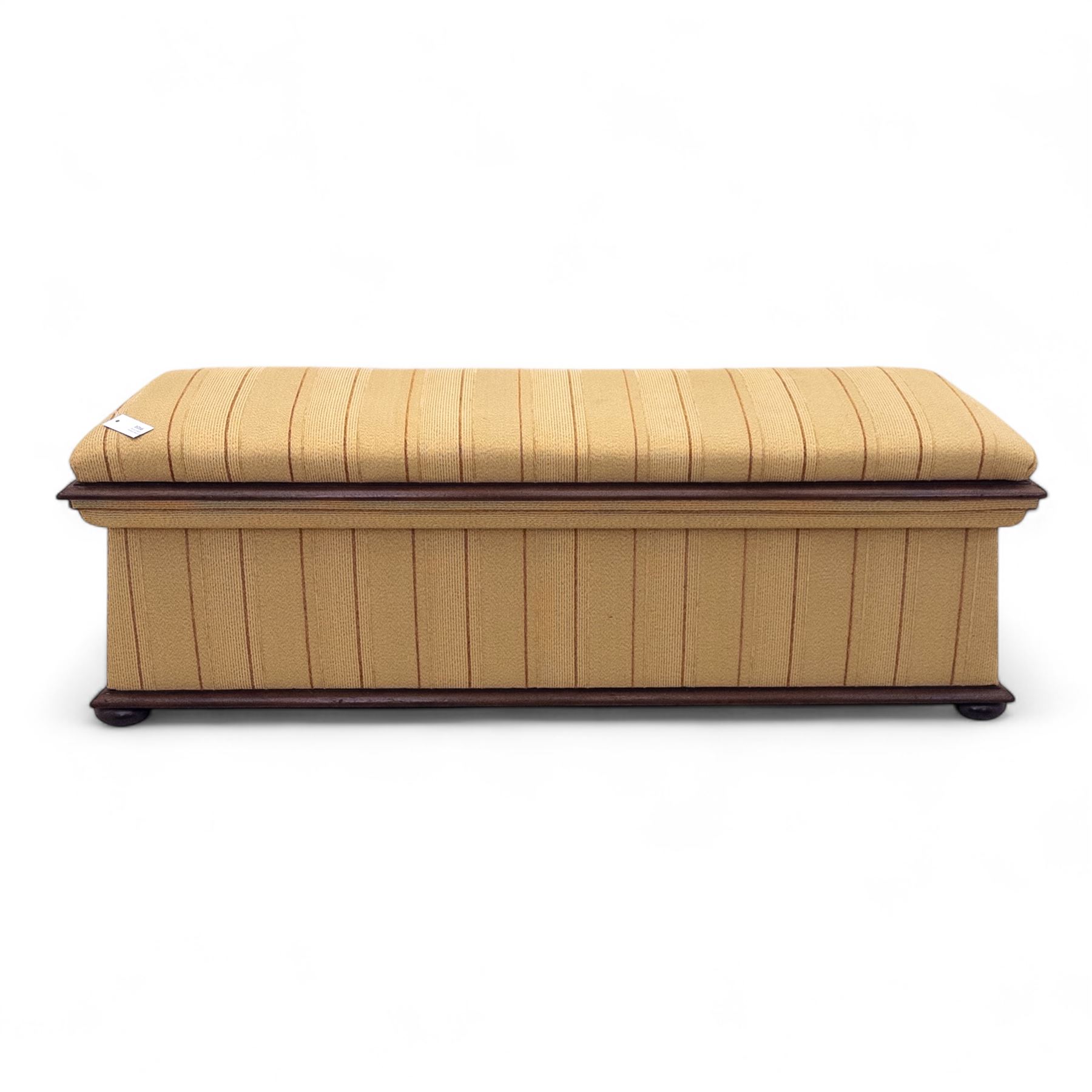 Late Victorian angular framed mahogany bay window seat, hinged lid with moulded upholstered padded seat, over upholstered front and sides, raised on compressed bun feet  
