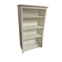 White painted open bookcase, fitted with three shelves