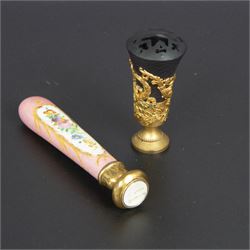 Gilt bronze mounted black glass seal, contained within a brass casket, with velvet interior and inner label reading 'C. F. Schmedding Augsburg', together with a porcelain handled seal decorated with floral sprays on a pink ground