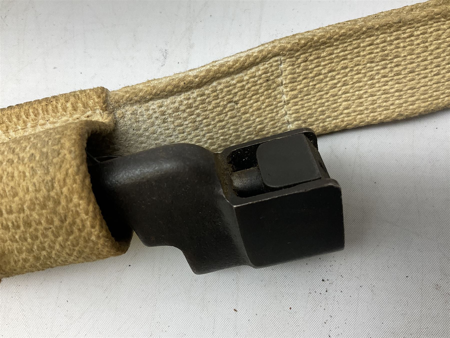 British Pattern 1876 socket bayonet with 43cm steel triangular blade L52cm overall; another socket bayonet with cruciform blade; No.4 Mk.II spike bayonet in metal scabbard with webbing frog; and 1955 Army jack knife by J.H. Thompson Sheffield (4)