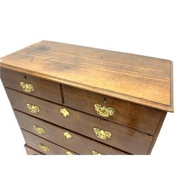 Georgian oak chest, fitted with two short and three long drawers, on bracket feet