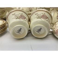 Royal Doulton ‘The Romance Collection’ dinner service decorated in the ‘Lisette’ pattern for six, to include lidded tureens, dinner plates, sauce boat and stand, coffee pot, coffee cups, bowls, lidded sucrier etc