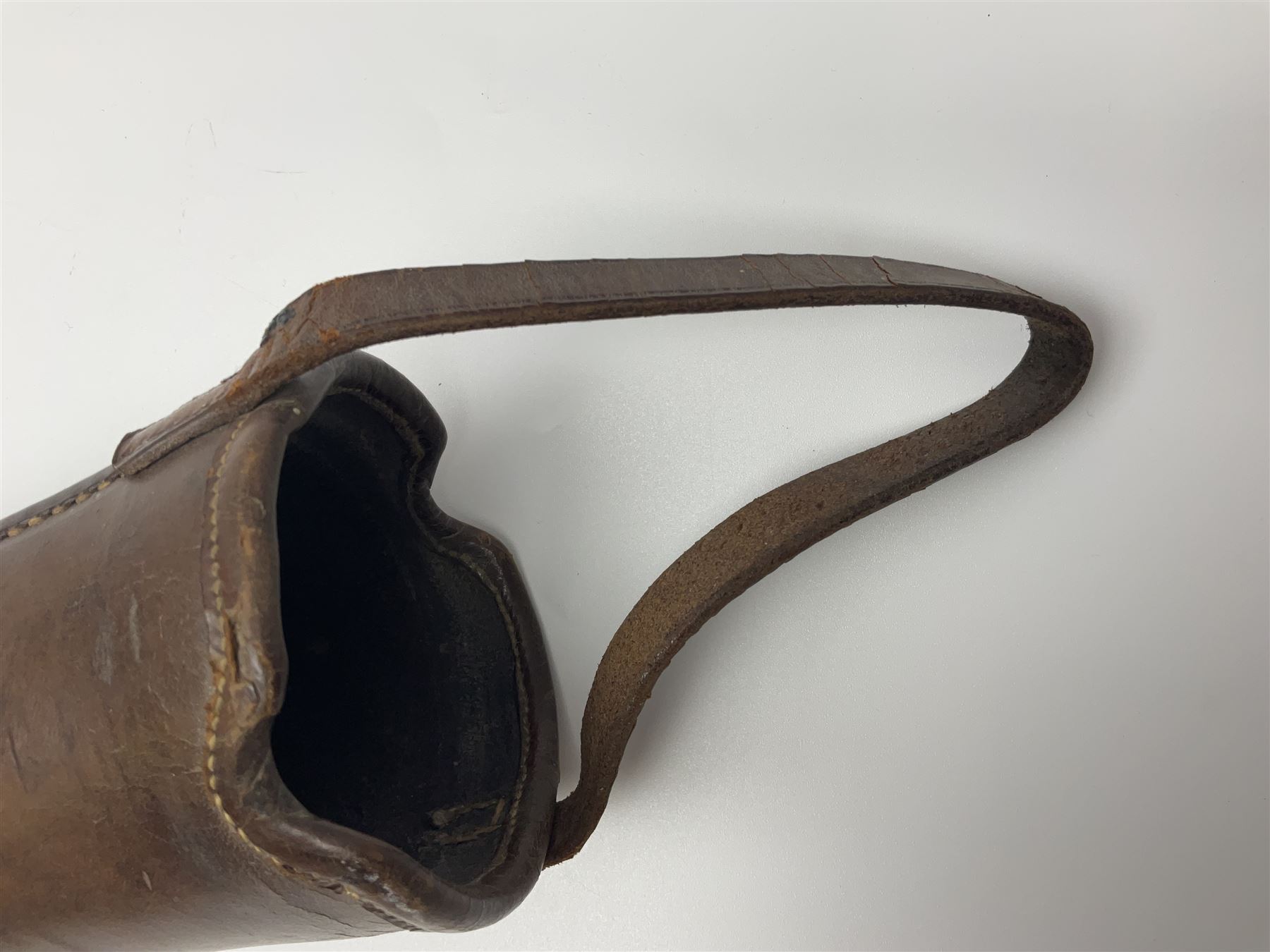 19th century telescopic hunting horn, the bell engraved 'The Beaufort', with makers mark Kohler & Son, makers, 61 Victoria Street, Westminster (from Covent garden) London, in a leather sheath, horn full extended L91cm 