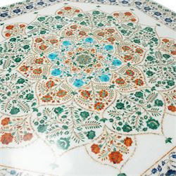 20th century Florentine design composite marble pietra dura centre table, octagonal white marble top inlaid with a polychrome foliate and floral medallion centred by a rosette, within a conforming floral border, raised on a faceted octagonal marble pedestal and stepped base
