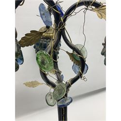 20th century continental table lamp, three scrolled branches entwined with gilded wire, vine leaves and green and blue glass flowers, the shades as bunches of grapes with blown glass beads, upon a marble base, H58cm 