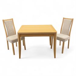 Ercol - light oak ‘Artisan’ rectangular dining table with chamfered top extending fold ove...