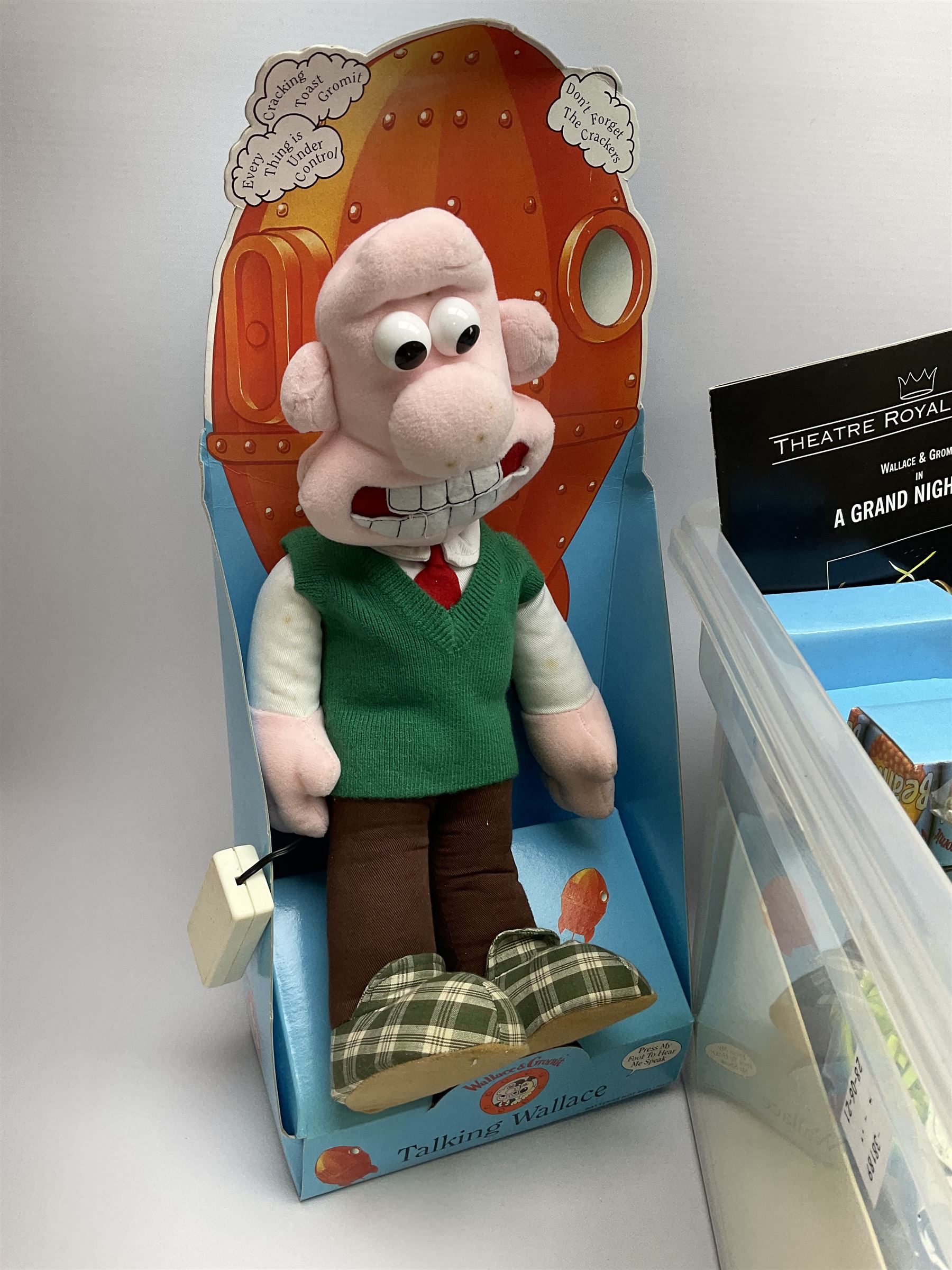 Quantity of Wallace and Gromit toys, accessories and memorabilia including soft toys, figurines, electronic ‘Talking Wallace’, car screen shades, and a quantity of Chicken Run Related merchandise, in three boxes
