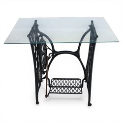 Sewing machine table with glass top, with Singer wrought metal base and foot pedal