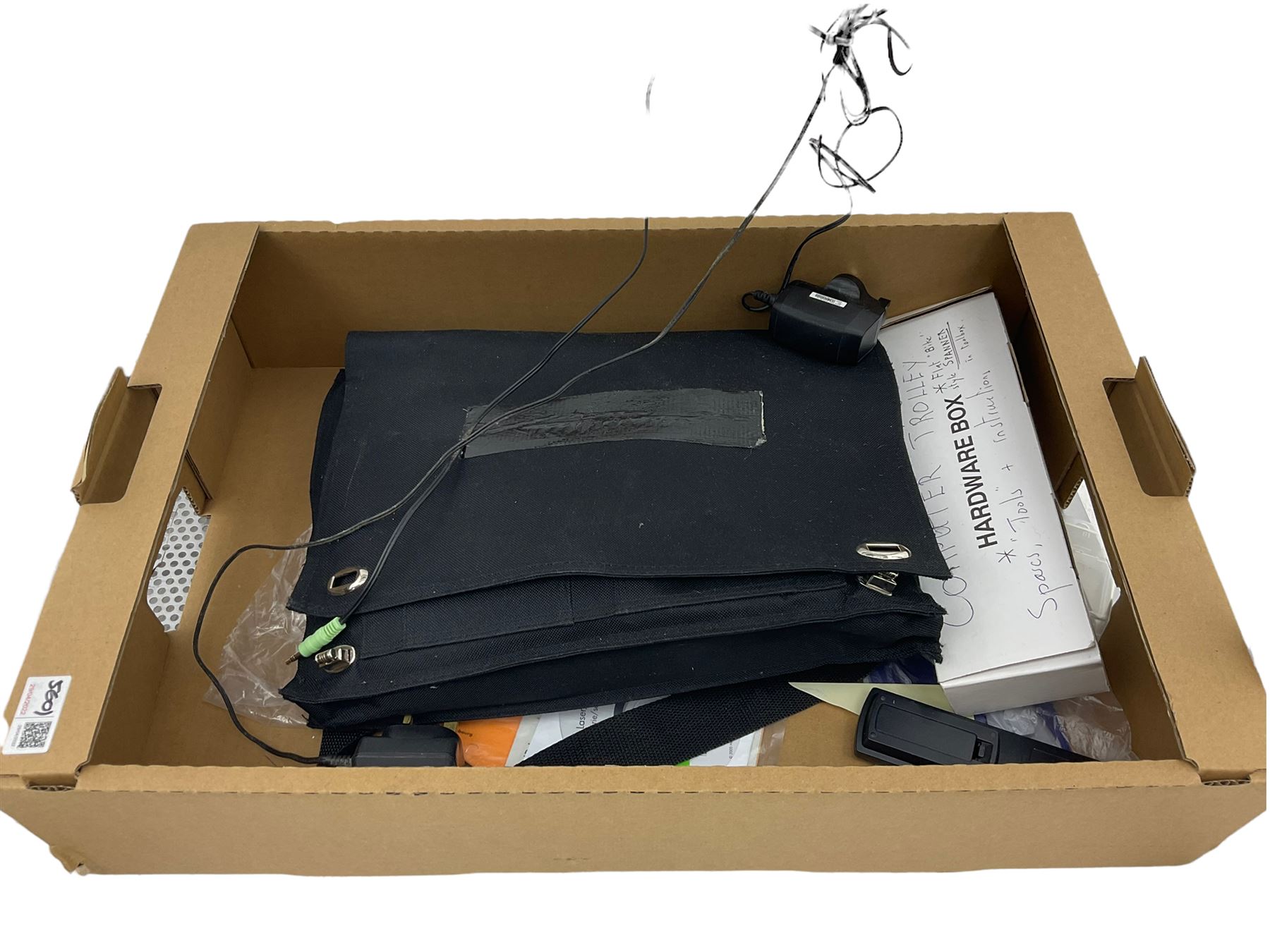 LG BP250 Blu-ray player, Sony floppy disk drive, pair Fujitsu speakers and various cables on computer stand