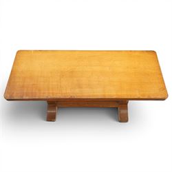 Mouseman - adzed oak rectangular refectory style coffee table, with rectangular adzed top, raised on octagonal supports united by a stretcher, with carved mouse signature, by the workshop of Robert Thompson of Kilburn