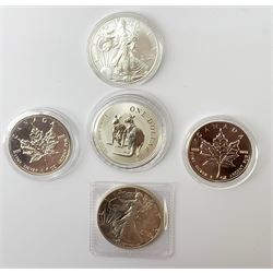 Five silver bullion coins, each containing one troy ounce of fine silver