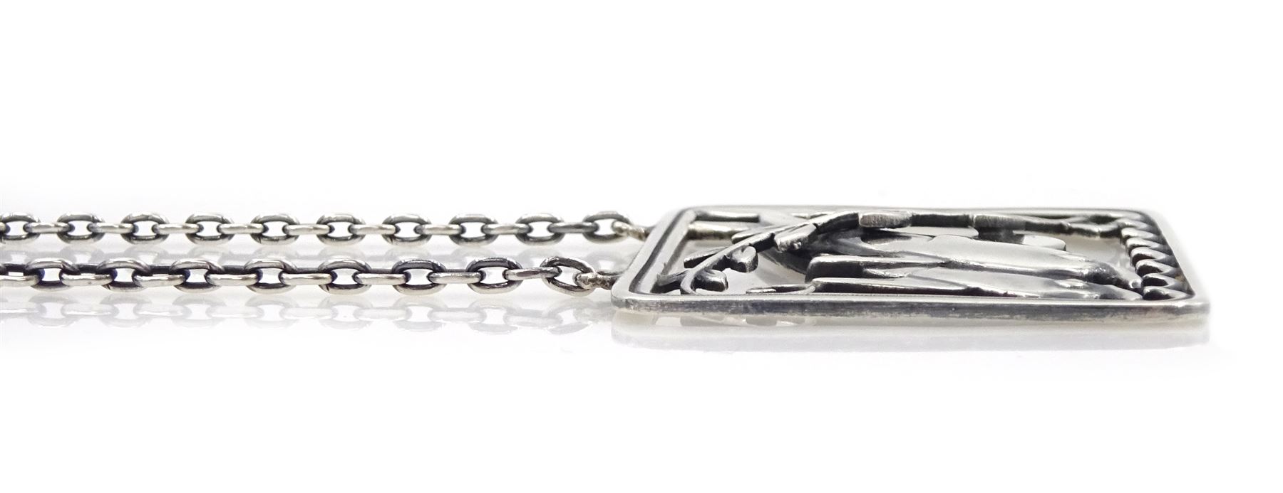 Silver double dolphin pendant necklace designed by Arno Malinowski for Georg Jensen, No. 94