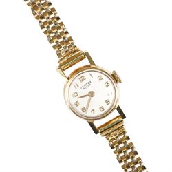 Vertex Revue ladies 9ct gold manual wind wristwatch, on 9ct gold bracelet, hallmarked