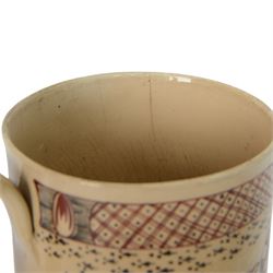 Late 18th century creamware documentary tankard, of cylindrical form with curbed handle, inscribed 'John & Dorothy Stockel 1783', above a floral spray and flanked by a seated female figure to one side, and bull and house to the other, H16.5cm