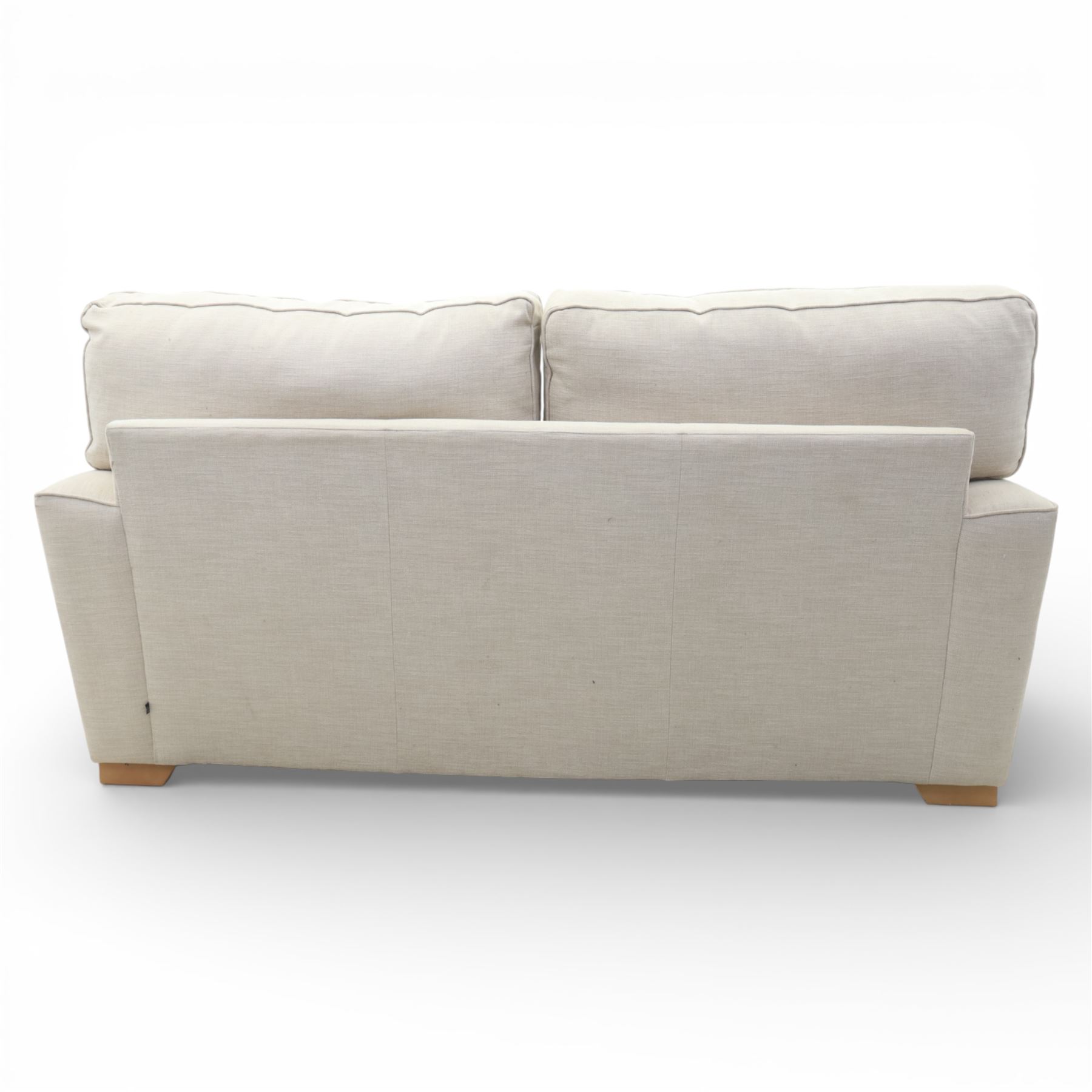 Next Home - Contemporary two seat sofa, square back and arms, upholstered throughout in beige fabric, fitted with two loose seat cushions and two loose back cushions, with arm cushions, raised on block wooden feet