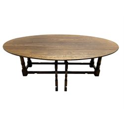 Large 18th century design oak wake or dining table, oval drop-leaf top, turned supports with double gate-leg action base, united by moulded stretchers 