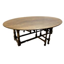 Large 18th century design oak wake or dining table, oval drop-leaf top, turned supports with double gate-leg action base, united by moulded stretchers 