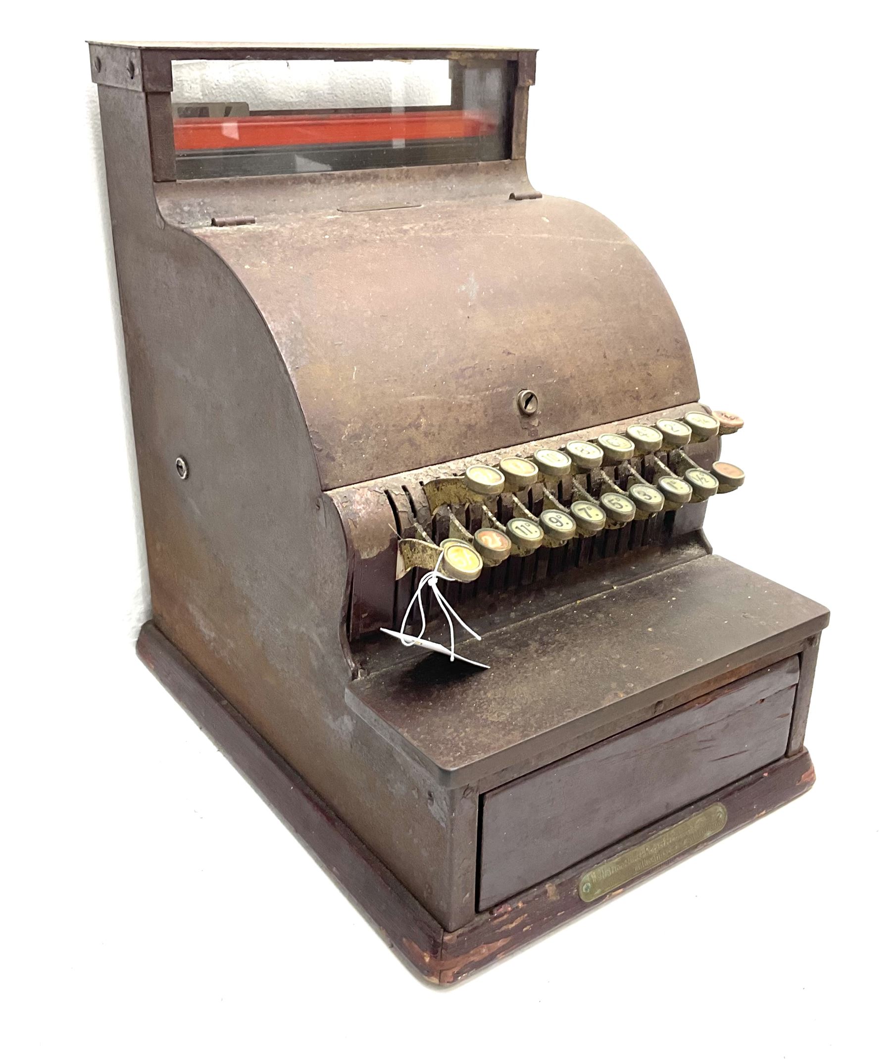 An Antique cash register, made by The National Cash register Co, Ltd. London, H43. 