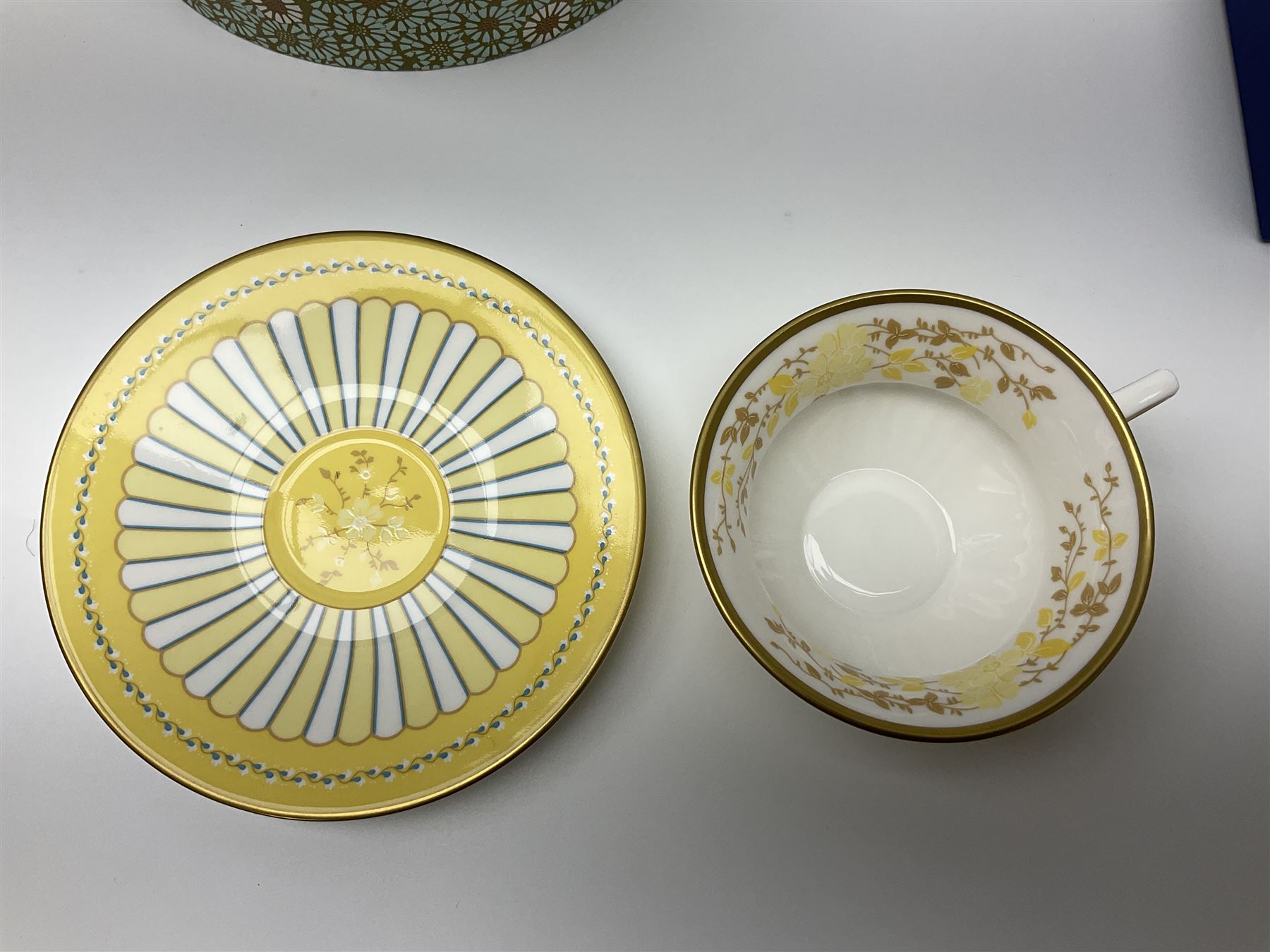 Wedgwood Yellow Ribbons cabinet cup and saucer, boxed and a Swarovski butterfly, boxed (2)