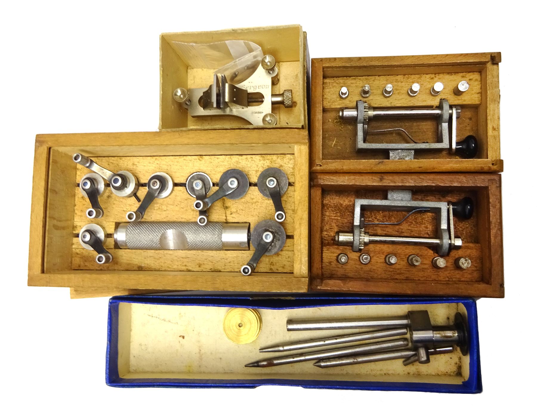 Collection of horologists/watch maker's tools and equipment including Tour a Pivoter, Staking tool by Kendrick & Davis patented Aug 26 1902, mainspring winders, two depthing tools, Poising tool, Witschi timegrapher (no power lead), Keeler optician glasses and collection of watch parts including cock balancers, hands, roller jewels etc