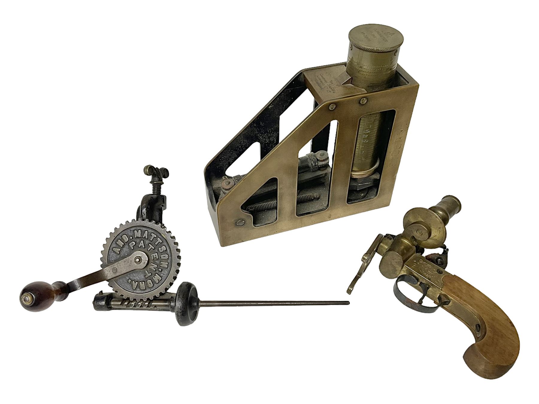 Cambridge Scientific Instruments Co clinometer, flintlock tinder lighter, and a Anders Mattson Mora patent bobbin winder (3)