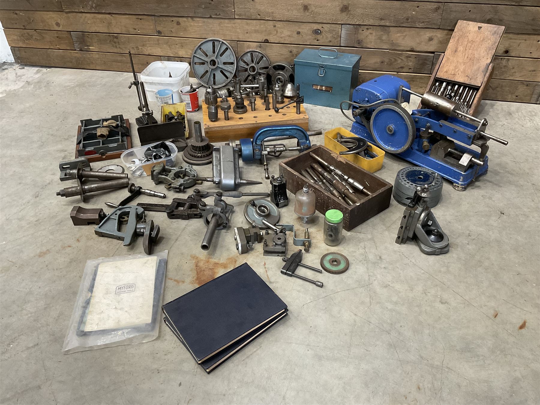 Myford Super 7 metal turning lathe with extensive collection of attachments, chucks, collets, bits; and precision metal saw