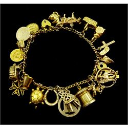 9ct gold link bracelet, with heart locket clasp, seventeen 9ct gold charms including tortoise, elephant and mouse, four 18ct gold charms and a 14ct gold charm, all hallmarked or tested