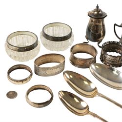 Collection of silver, including pepper shaker, mustard pot, three spoons, two silver collared glass salts and six napkin rings, all hallmarked 