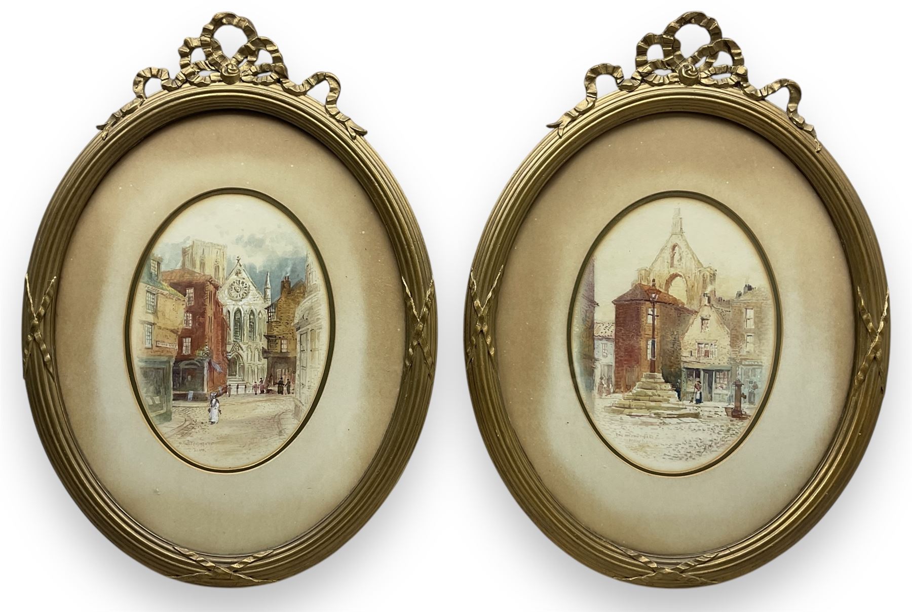 John Wynne Williams (British fl.1900-1920): 'Micklegate - York' and 'The Market Place - Howden', pair oval watercolours signed 23cm x 16cm (2)