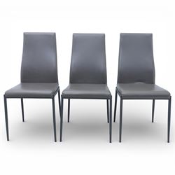 Modern composite marble effect dining table, rectangular top with simulated veining supported on a block pedestal base, accompanied by six matching dining chairs with padded seats and backs in grey upholstery on slim metal legs