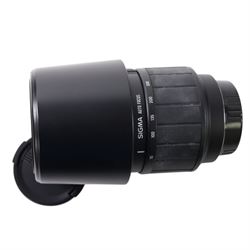 Eight camera lenses, comprising Canon Ultrasonic Zoom EF 75-300mm 1:4-5.6 lens, AF Nikkor 35-70mm 1:3.3-4.5 lens, Nikkor 60-180mm 1:4.5-5.6 lens, Canon Zoom EF 28-80mm 1:3.5-5.6 lens, Canon Zoom EF 80-200mm 1:4.5-5.6 lens, Sigma 70-300mm 1:4.6-5.6 DL Macro, Sigma Zoom 70-210mm 1:4-5.6 UCII lens and a Sigma AF 70-300mm 1:4-5.6 APO Macro lens, all with lens caps