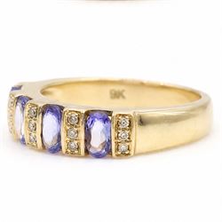 9ct gold tanzanite and diamond half eternity ring, four oval cut tanzanite's, each spaced by three single cut diamonds, hallmarked