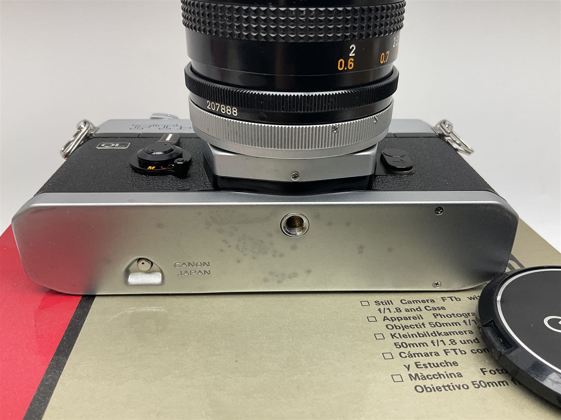 Canon FTb camera body, serial no. 715838, with 'Canon FD 50mm 1:1.8' lens, serial no. 207888, in original box, together with Canon FTb camera body, serial no. 557817, with 'Canon FD 35mm 1:3.5 S.C' lens, serial no. 126210 and Canon EX Auto camera body, serial no. 296244 with 'Canon EX 50mm 1:1.8' lens, serial no. 380869  