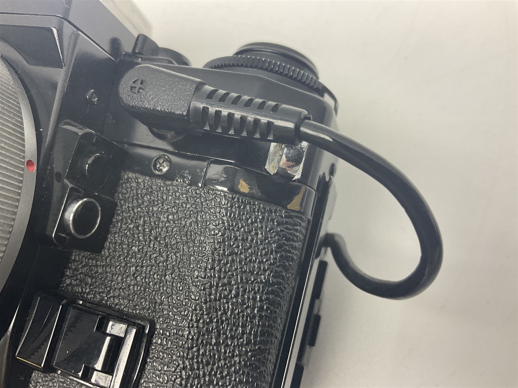 Canon A-1 camera body, serial no. 341014, with 'Canon FD 50mm 1:1.4 S.S.C.' lens, serial no. 12077119 and motor drive MA