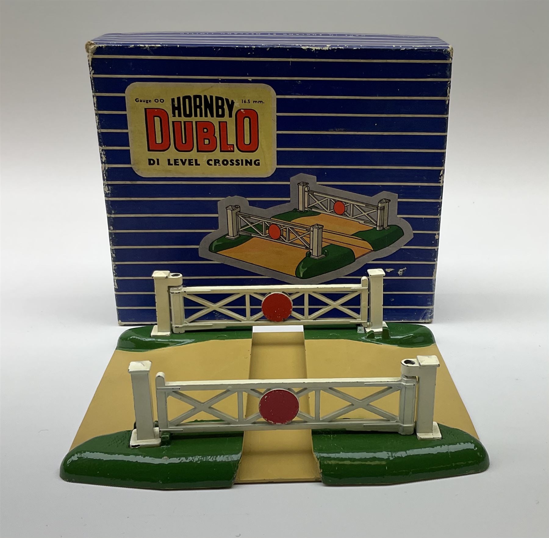 Hornby Dublo - six D1 accessories comprising Turntable; Through Station with white edges and separately boxed Platform Extension with Wall; Signal Cabin with orange roof and pack of station names; Level Crossing; and Island Platform; all boxed (6)