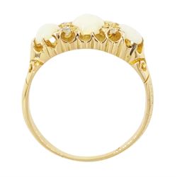 Early 20th century 18ct gold opal and diamond ring, three graduated oval cut opals, spaced by four accent diamonds