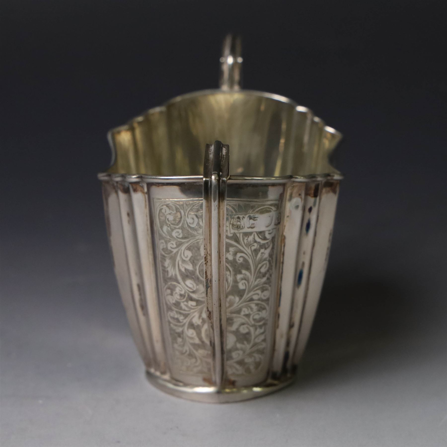 Late Victorian silver twin handled open sucrier and milk jug, of fluted form with panels of engraved foliate decoration, hallmarked D & M Davis, London 1896