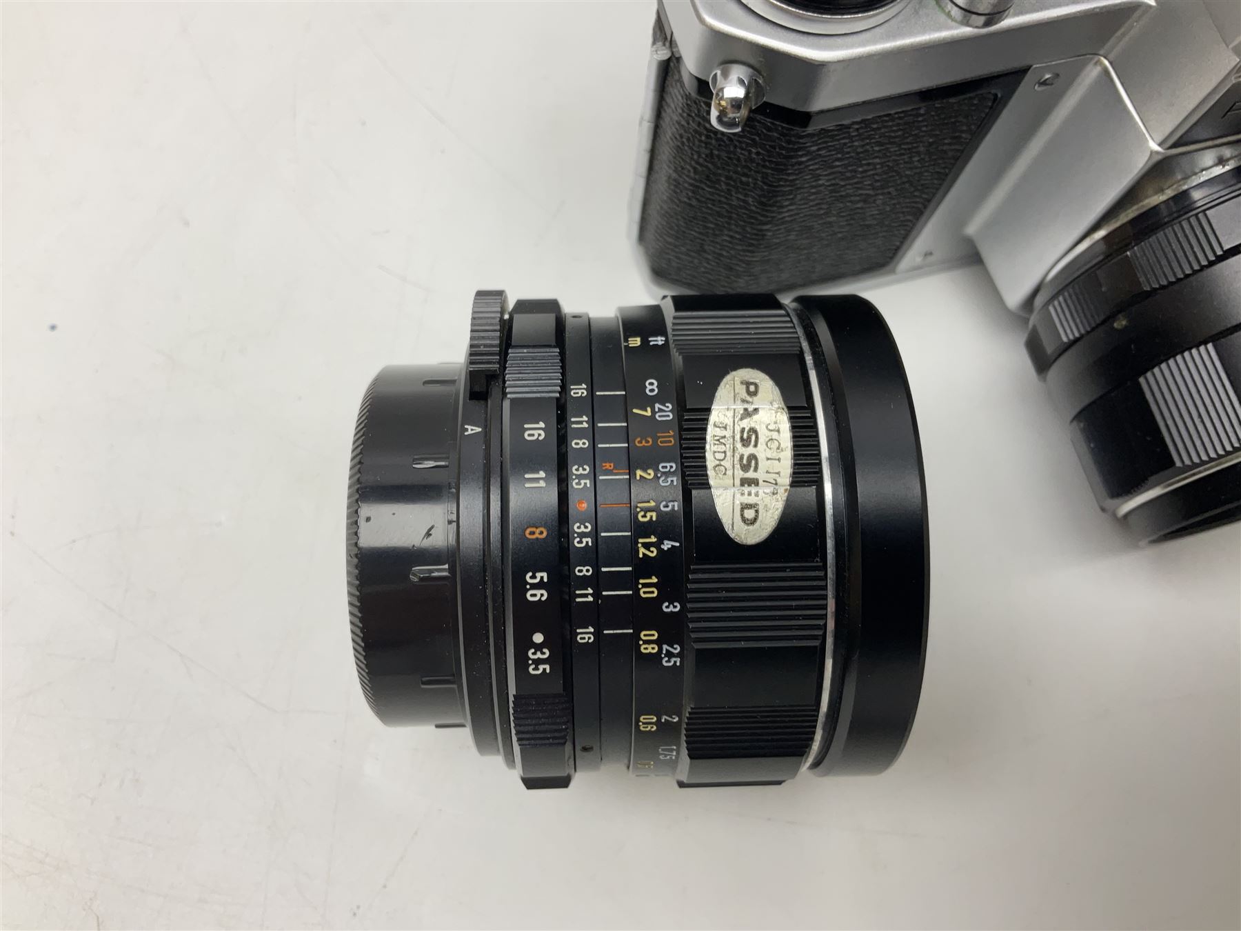 Asahi Pentax S1a camera body, serial no. 707071, with 'Super-Takumar 1:1.8/55' lens, serial no 2124044, together with Asahi Pentax Sv camera body, no. 1925617 with 'Super-Takumar 1:2/55' lens, serial no. 2770153, Asahi Pentax Meter, 'Super-Takumar 1:3.5/28' lens, serial no. 2075492 and 'Super-Takumar 1:4/150' lens, serial no. 1461613  