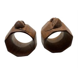 Mouseman - pair of oak napkin rings, of bulbous octagonal form each carved with mouse signature, by the workshop of Robert Thompson, Kilburn, L5cm 
 W7cm