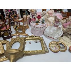 Dolls house living room and ding room furniture, including sofa, chair, long case clock, Christmas trees, fireplace, dresser, chairs, tables, mirrors, seven figures and a collection of predominantly Christmas themed decorations, food, etc