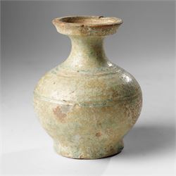 Green glazed 'Hu' jar, probably Han Dynasty, with flared rim H15.5cm 
