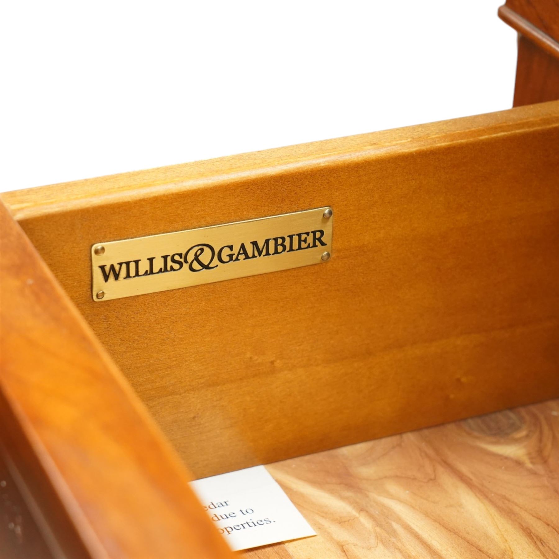 Willis & Gambier - 'Directoire' tall chest of drawers, rectangular top above an arrangement of seven drawers, raised on tapered and turned feet