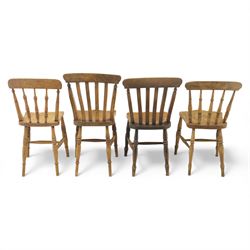 Eight Victorian farmhouse chairs in elm and beech, spindle-back frames with moulded seats, on turned and plain supports