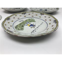 Four French Faience plates, comprising Je suis las de le porter, Le malheur nous reunit, Je desire y arriver and Eveque de Meaux, D24cm  