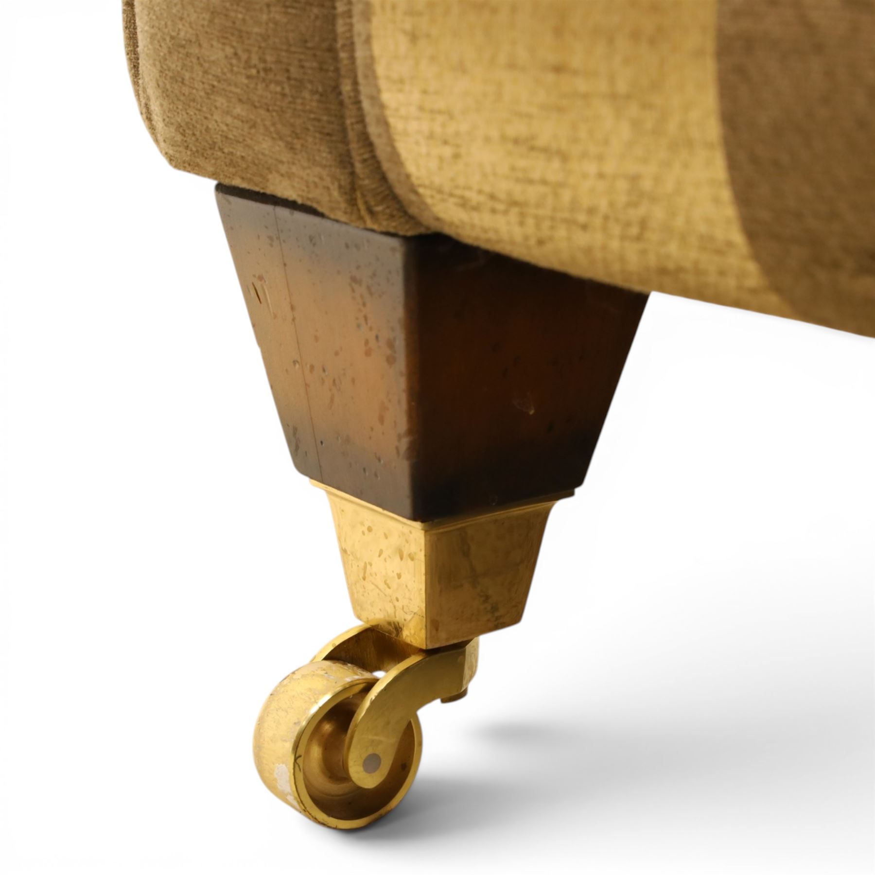 Alstons - 'Ixworth' three seat sofa, upholstered in striped fabric, with loose seat cushions and scrolled arms, front brass castors